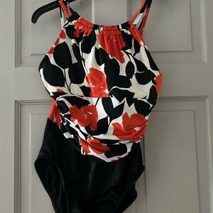 Orange and black one piece swim suit